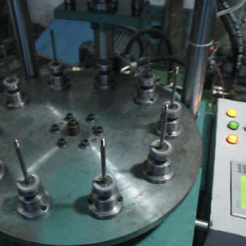 轉(zhuǎn)盤壓軸機